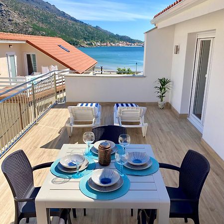 Apartamentos Ezaro Beach ดุมเบรีย ภายนอก รูปภาพ